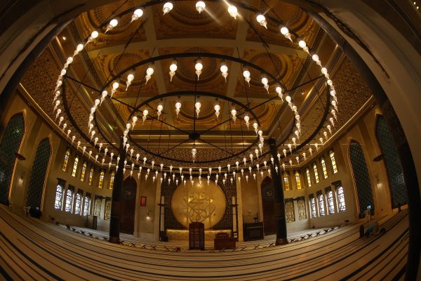 This picture shows a view inside the Katara Mosque, also known as "Qatar's Turquoise Mosque, designed by Turkish architect Zainab Fadil Oglu, in Katara Cultural Village in Doha on July 15, 2025. (Photo by Karim JAAFAR / AFP)